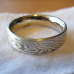 mokume gane wedding ring with rails